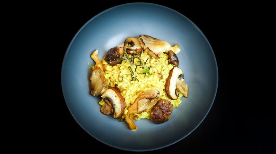 Plate with risotto and mushrooms