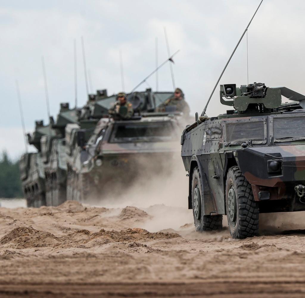 NATO vehicles on a training ground in Lithuania