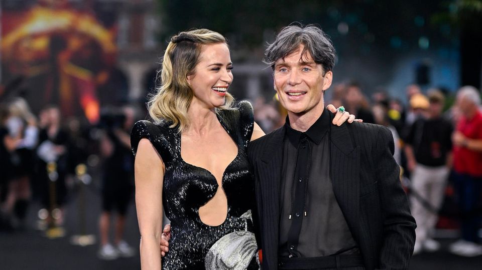 Emily Blunt and Cillian Murphy at the premiere of "Oppenheimer" on Thursday evening.  Shortly thereafter, the two actors left the premiere due to the Hollywood strike.