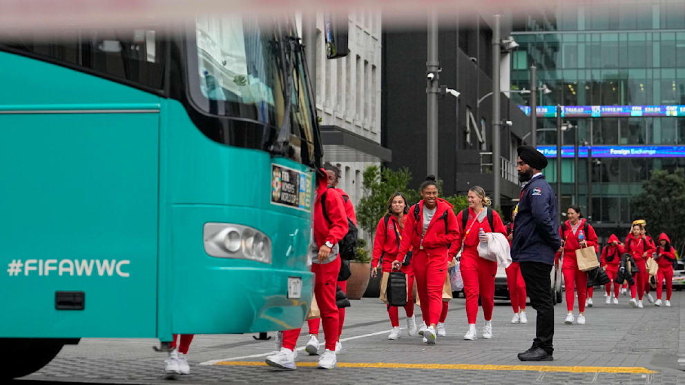Players of the Philippines leave the team hotel