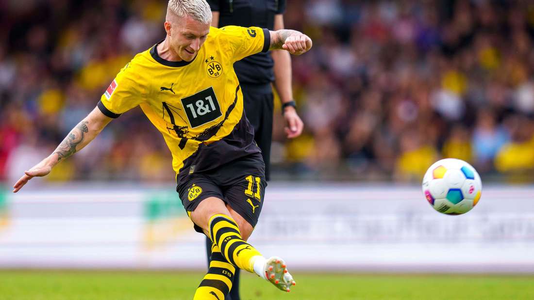 BVB star Marco Reus executes a free kick