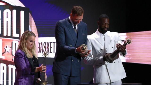 Basketball icon: Three new Hall of Fame members: Becky Hammon (left), Dirk Nowitzki and Dwyane Wade on stage in Springfield, Massachusetts.