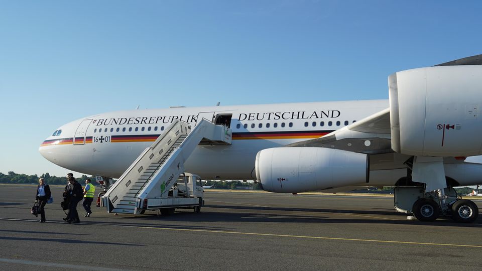 The government Airbus A340 is parked on the runway at Tegel Airport