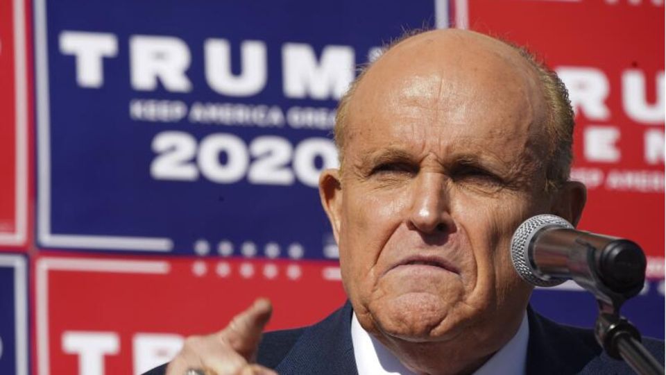 Rudy Giuliani, speaks at a news conference in a landscaping company parking lot November 7, 2020 in Philadelphia