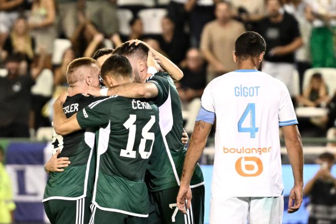 Panathinaikos players celebrate the one and only goal of the game against Olympique de Marseille on August 9 in Athens, Greece. 