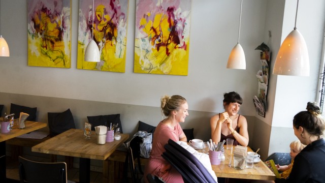 Daytime Café Deli Kitchen: The interior design is colorful but minimalist.