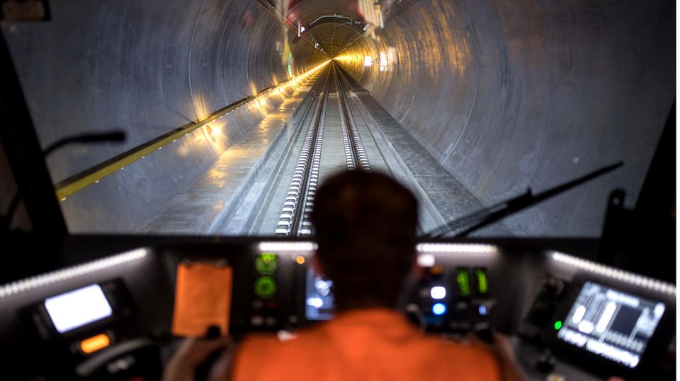 Image 1 of 9 in the photo series to click on: The longest railway tunnel in the world This is the Gotthard Base Tunnel, which opened in 2016 and is 57 kilometers long.  Cars and trucks are put on rails.  Passenger trains sometimes rush through at 200 kilometers per hour and the journey takes less than 20 minutes.