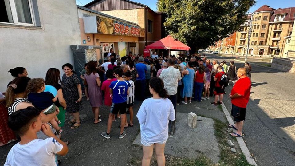 People queue for bread outside a bakery in Stepanakert, Nagorno-Karabakh.  The situation in the enclave worsened due to the