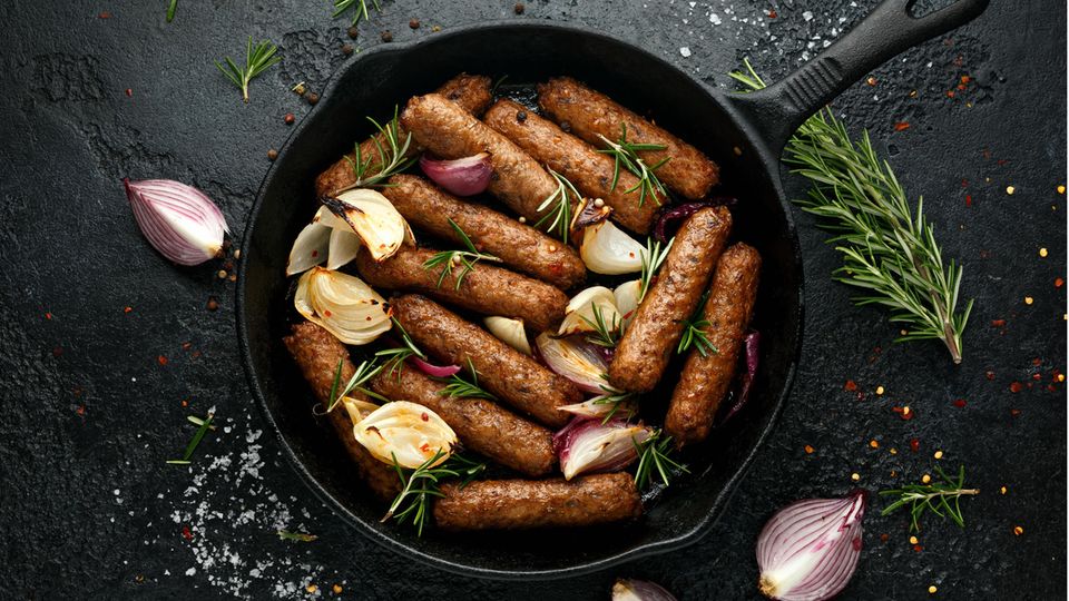 Vegetarian sausage in frying pan
