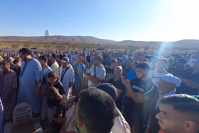 People attend the funeral of Bilal Qissi, in Saidia, northeast Morocco, August 31, 2023.