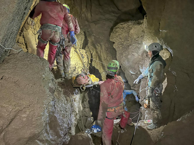 Members of the CNSAS, the Italian Alpine and Speleological Rescue Corps, lift speleologist Mark Dickey on a stretcher, into Morca Cave, southeast Turkey, September 11, 2023.