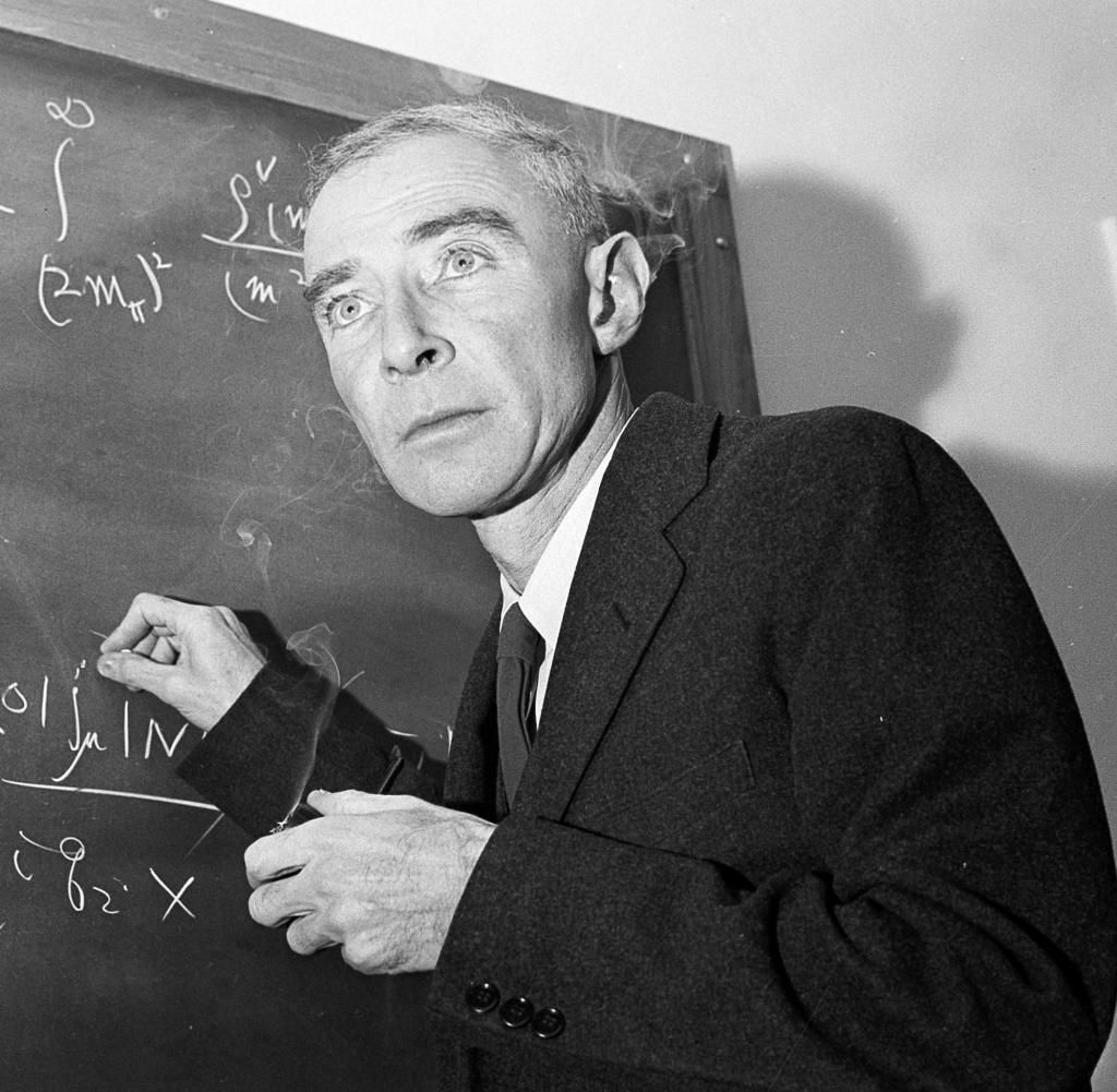 FILE - Dr.  J. Robert Oppenheimer, creator of the atom bomb, is shown at his study at the Institute for Advanced Study, in Princeton, NJ, Dec.  15, 1957. A new film on Oppenheimer's life and his role in the development of the atomic bomb as part of the Manhattan Project during World War II opens in theaters on Friday, July 21, 2023. (AP Photo/John Rooney, File)