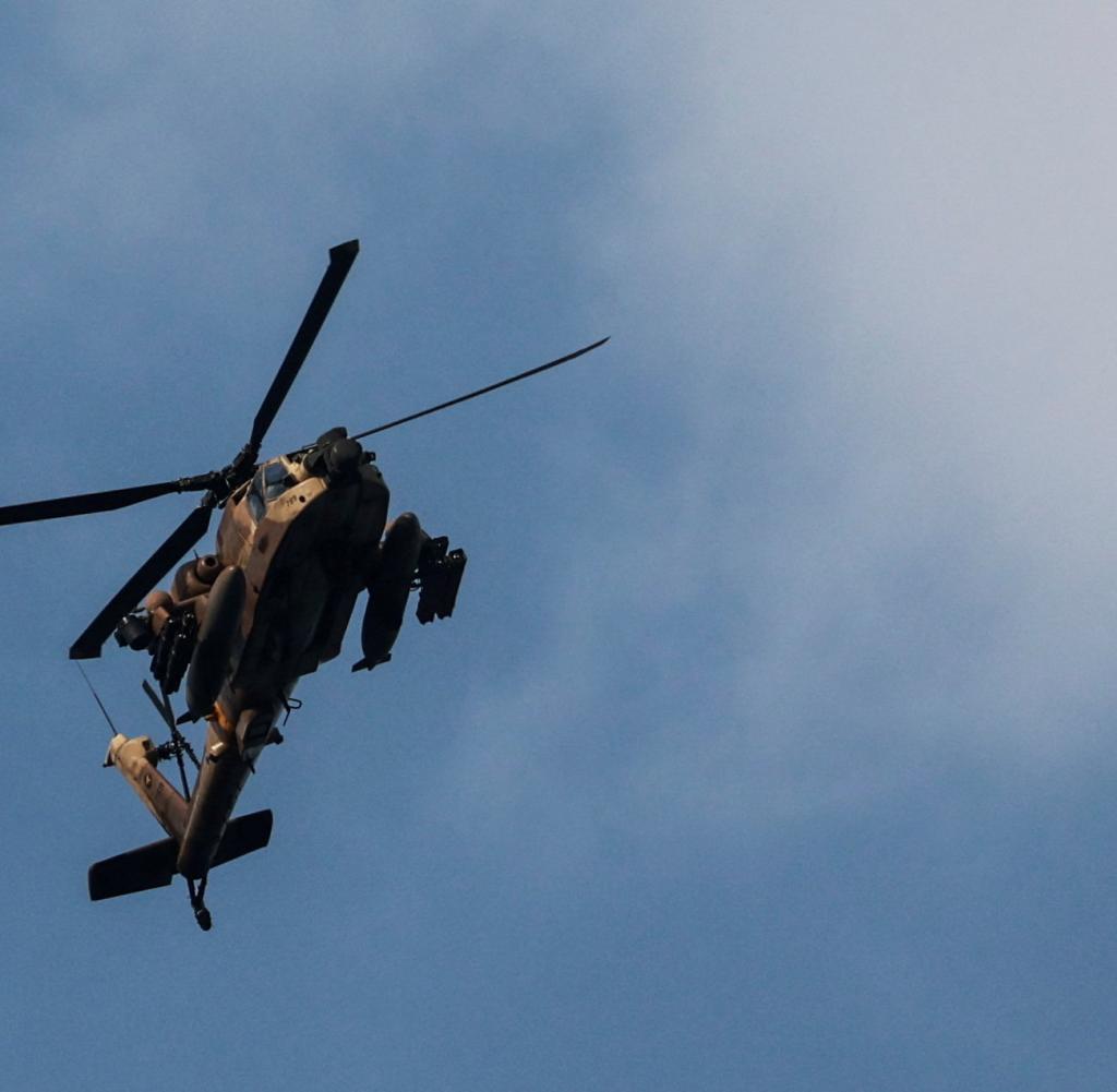 An Israeli Apache attack helicopter in the north of the country on Monday