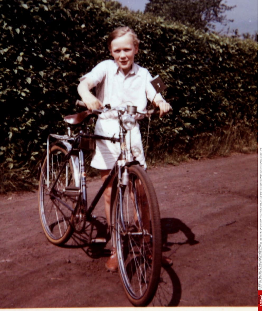 Carlo as a child with his beloved bicycle