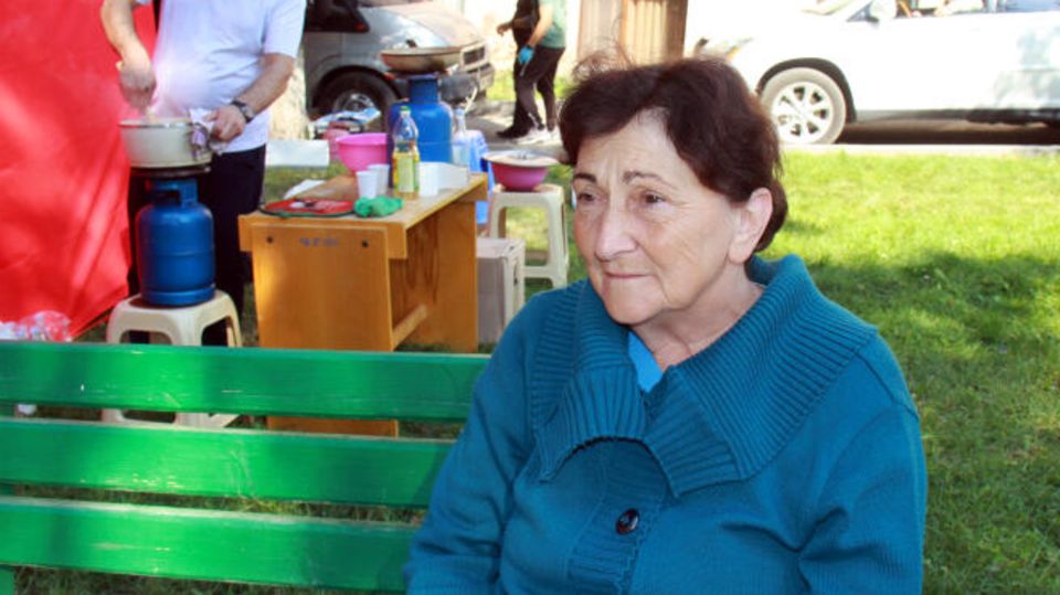Vayk, Armenia.  The 68-year-old Shasmin sits exhausted on a bench after fleeing Nagorno-Karabakh for several days