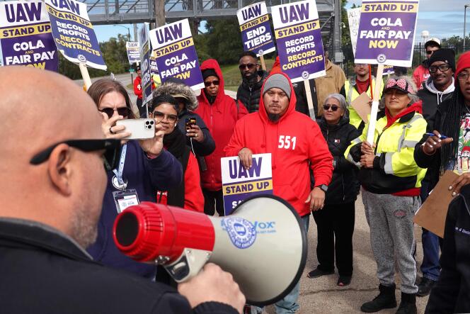 Employees of automobile manufacturers, unionized UAW, demonstrate in Chicago, Illinois, October 10, 2023.