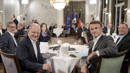 German Chancellor Olaf Scholz and French President Emmanuel Macron, October 9, 2023, in Hamburg (Germany).  (MARKUS SCHREIBER / AFP)