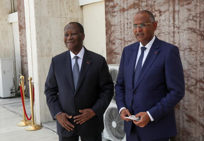 Ivorian President Alassane Ouattara and his Prime Minister Patrick Achi in Abidjan in April 2021.