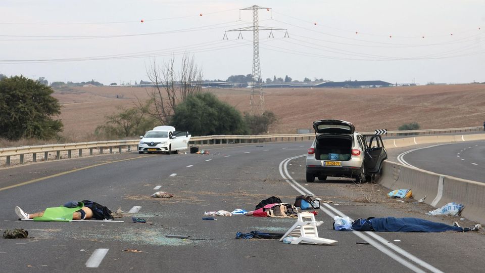 Israel: Bodies lie on a main road near the Gevim kibbutz on October 7, 2023