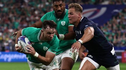 Irishman Hugo Keenan was one of the great architects of the victory against Scotland on October 7, 2023 at the Stade de France.  (ANNE-CHRISTINE POUJOULAT / AFP)
