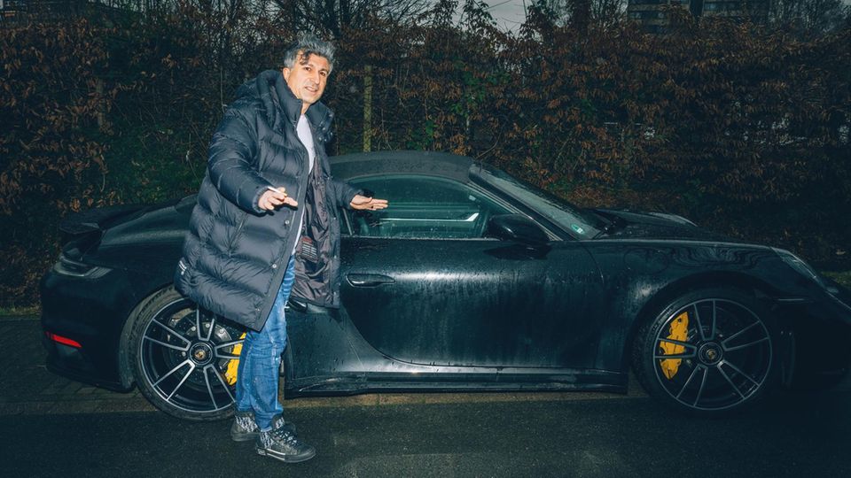 Chico in front of his Porsche