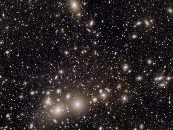 The 1000 galaxies of the Perseus cluster.  Astronomers have shown that galaxy clusters like Perseus could only have formed if there was dark matter in the universe.