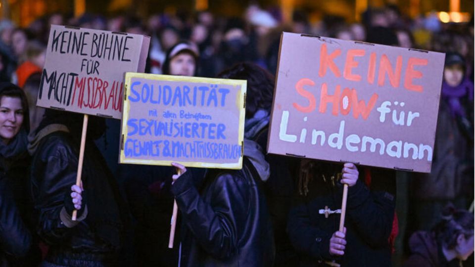 "No show for Lindemann" is written on a protester sign at the Leipzig Arena