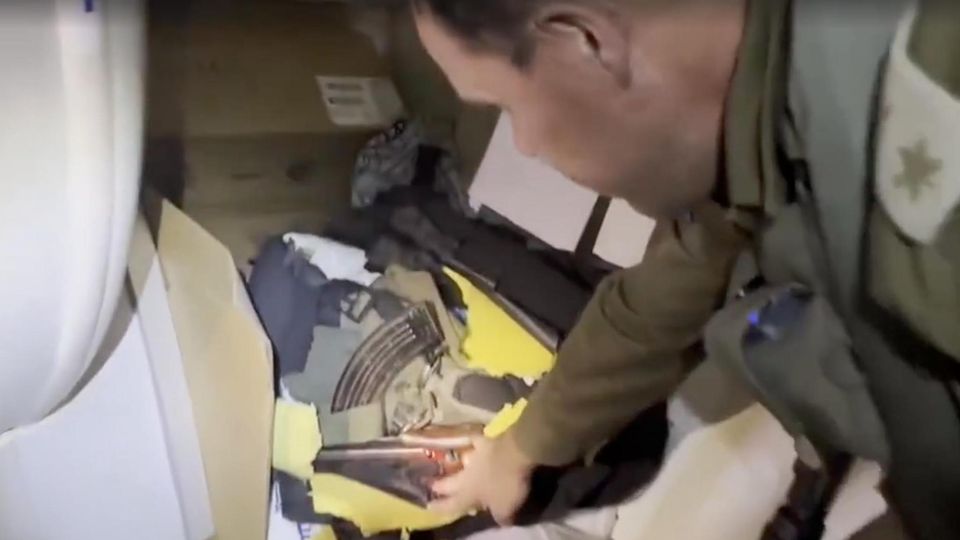 Shifa Hospital: IDF Lt. Col. Jonathan Conricus inspects a bag