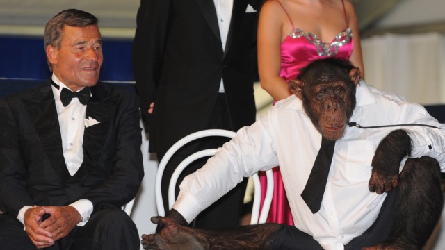 Wolfgang Grupp with a chimpanzee