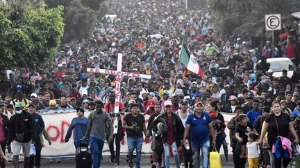 People walk in the streets of Tapachula, in the state of Chiapas (Mexico), with the aim of reaching the United States, December 24, 2023. (AFP)