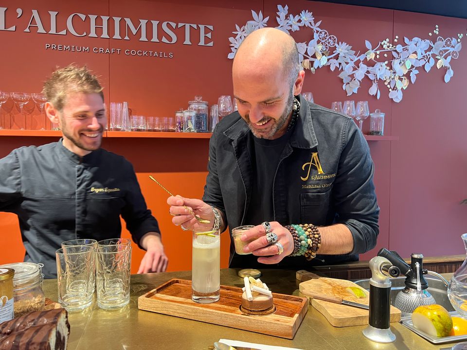 Pastry chef Bryan Esposito (left) and NoLo mixologist Thomas Giroud prepare a soft pairing for a Mont Blanc on the corner of L'Alchimiste at Printemps Haussmann