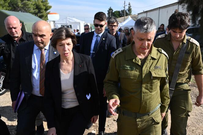 French Minister of Foreign and European Affairs Catherine Colonna, Israeli army spokesperson Colonel Olivier Rafowitcz and French Ambassador to Israel Frédéric Journès during a visit to the Shura military base near Ramle, in the Central District of Israel, December 17, 2023.