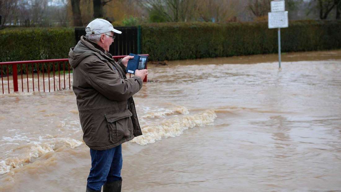 This man is standing in the water in Bovenden