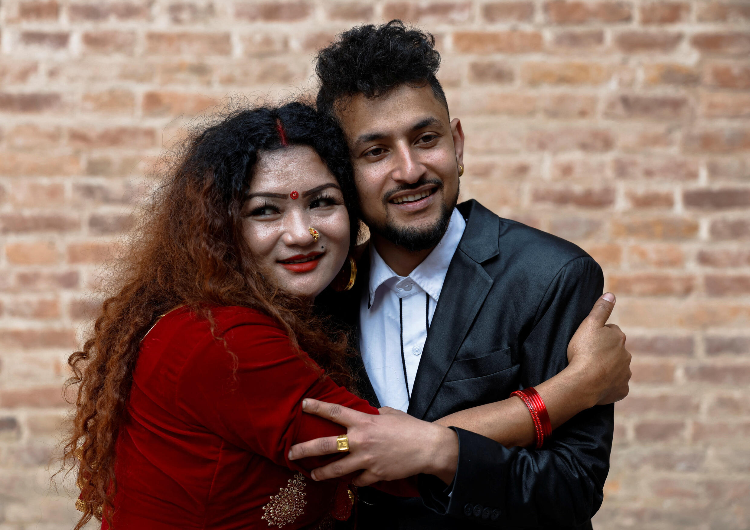 Ram Bahadur Gurung, transgender woman and Surendra Pandey, during a press conference after formalizing their marriage on December 1, 2023, in Kathmandu, Nepal.