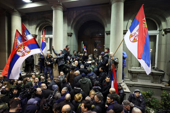 Supporters of the opposition Serbia Against Violence (SPN) demonstrate in front of Belgrade City Hall, after the SPN alleged major electoral law violations in Serbia's municipal and parliamentary elections, December 24 2023. 