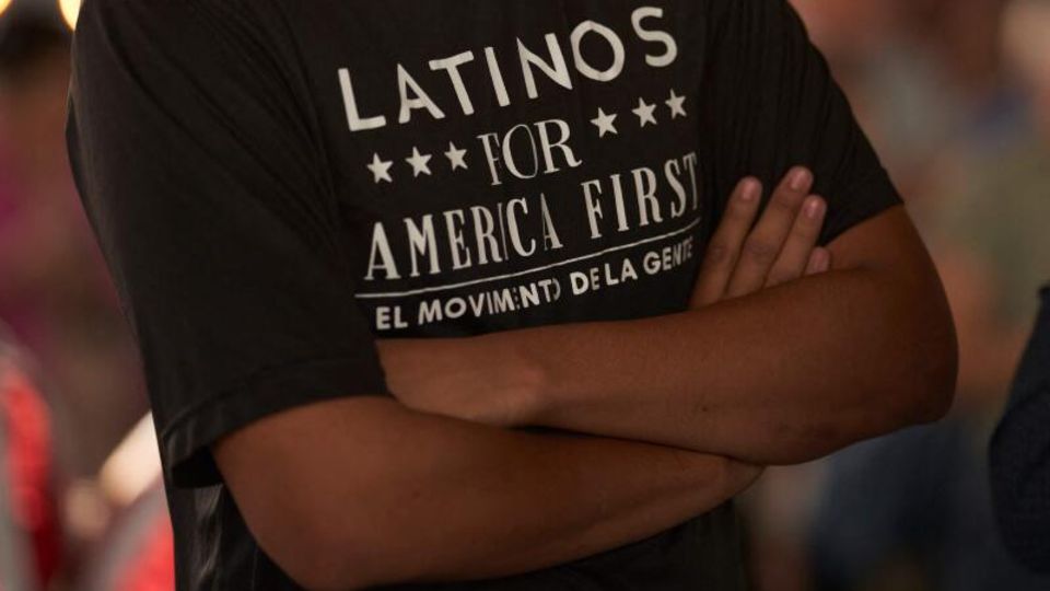 Before the midterms: A Trump supporter in Texas wears a T-shirt with the slogan "Latinos for America First"