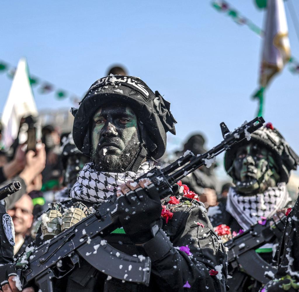 Fighters from the Qassam Brigades, Hamas' armed wing