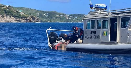 Diver transfers body to Coast Guard boat