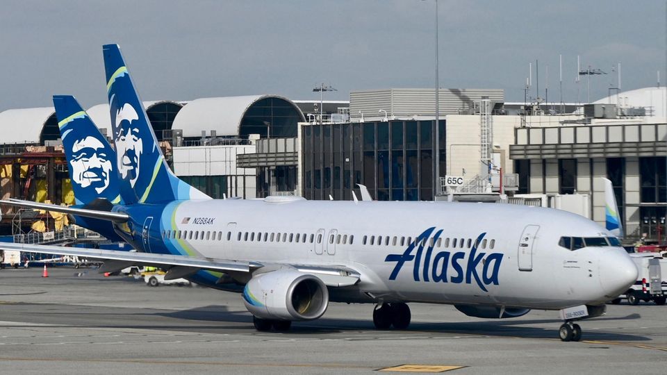 An Alaska Airlines plane is at the airport