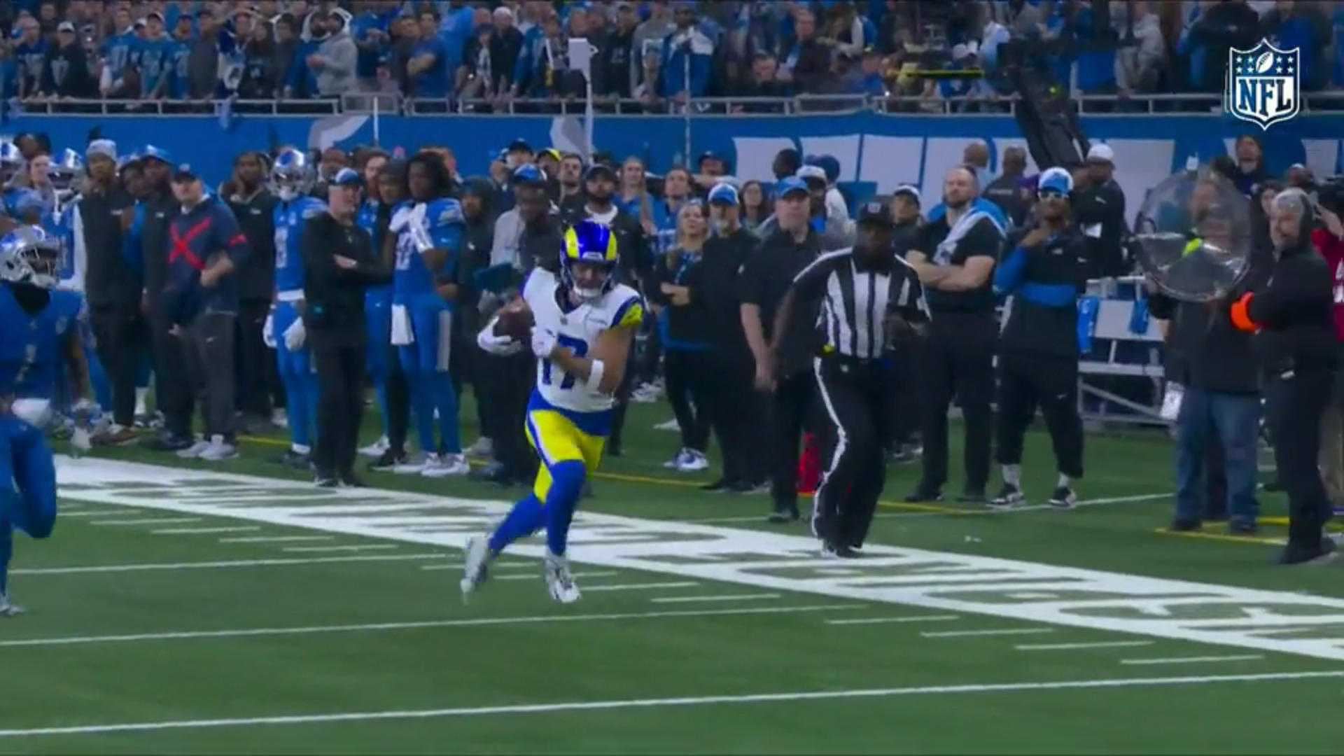 Puka Nacua runs unstoppably into the end zone. First playoff TD for rookie