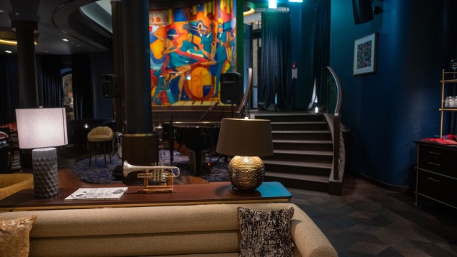 Bar Montez: Brightly lit paintings in bold shades of blue and money adorn the bar's walls.