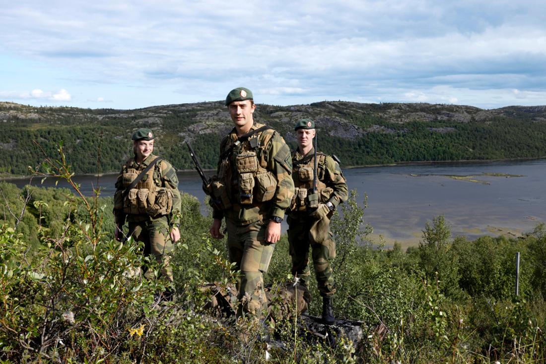 Norwegian soldiers stand not far from Kirkenes on the border with Russia.
