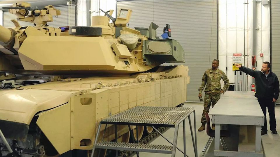 In the photo you can see the aprons made of reactive armor.  There is a box with a defense system on the tower.
