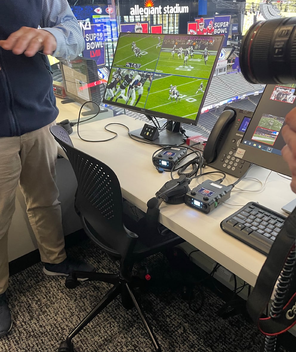 With 105 camera angles, medical observers can see whether a player is injured or not.  In front of the phone is a device with two buttons.  If one of them is pressed, the referees stop the game