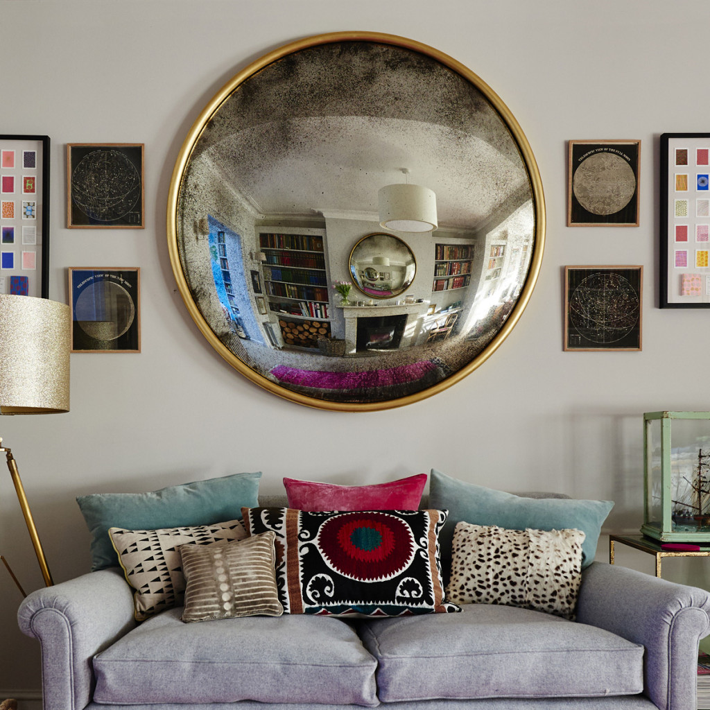 The Xxl Convex Mirror Above The Fireplace 