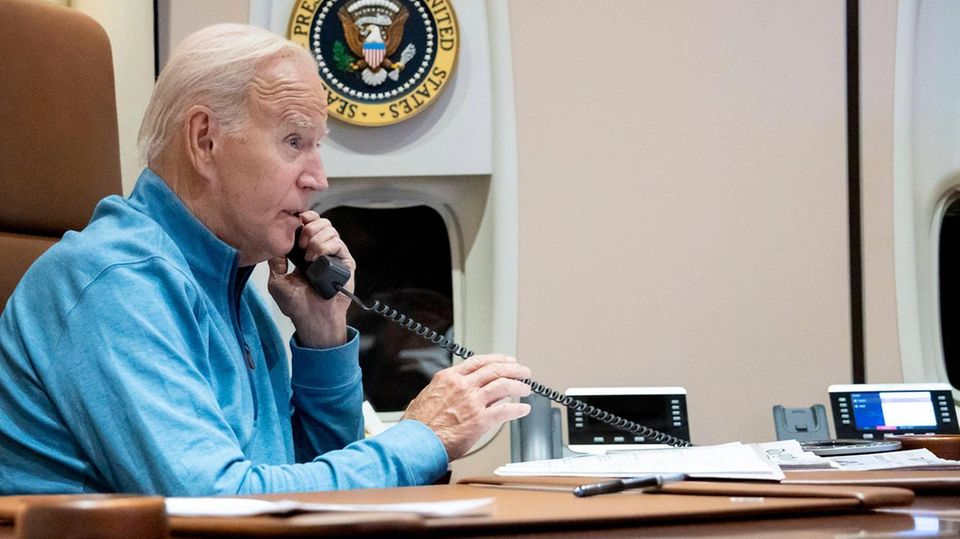 Joe Biden on the phone on board Air Force One