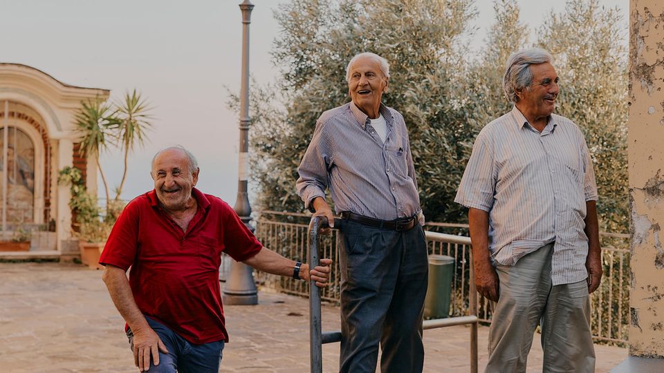 A little older - but pretty relaxed: Pietro, 68, Giuseppe, 90, and Giuseppe, 74, (from left to right) on the village square in Pollica