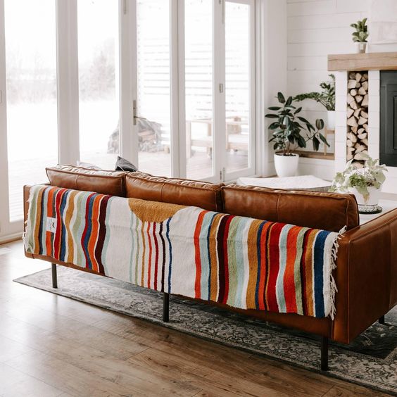 The Ethnic Rug to Twist the Leather Sofa 