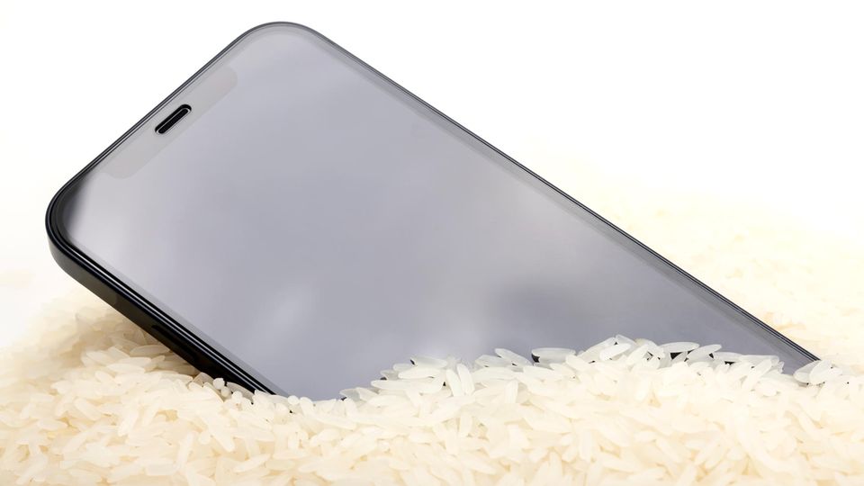 If the smartphone is wet, it is often recommended to soak it in rice.  But Apple warns against this for the iPhone