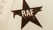 The RAF logo, the star with the letters and a machine gun © dpa-Bildfunk 